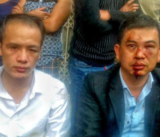 Human rights lawyers Tran Thu Nam and Le Luan attacked